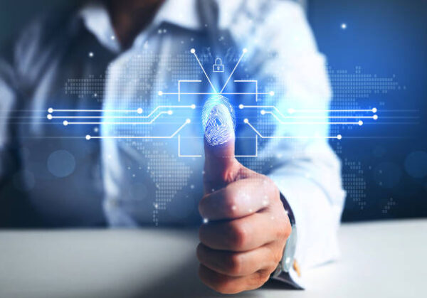 istockphoto-1306996399-612x612 Woman using fingerprint indentification to personal access. Biometrics security, E-kyc, innovation technology concept